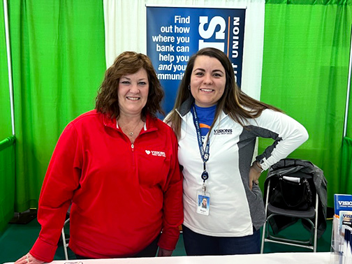 Visions employees Kathy (left) and Megan (right) pictured at the Visions table at the Binghamton Home and Garden Show.