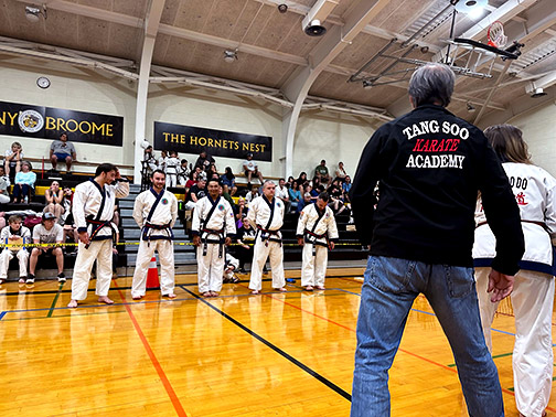 Participants of the Fairbanks Karate Tournament standing in the gymnasium at SUNY Broome.