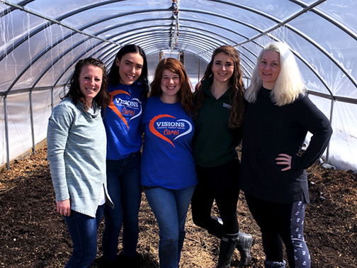 The Visions Human Resources team volunteering at VINES garden in Downtown Binghamton, NY.