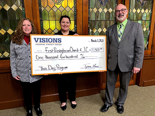 Pictured from left to right is Amy (Outreach Coordinator, First Presbyterian Church of Johnson City), Jocelyn (Community Development Liaison), and Reverend Robert (Pastor, First Presbyterian Church) holding a giant check 
