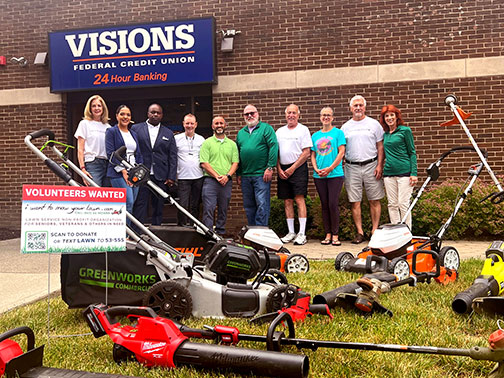 Visions employees pictured with I Want to Mow Your Lawn volunteers and the organization’s founder, Brian Schwartz, in front of the Mahwah, NJ Visions branch.