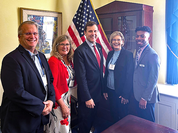 Tom Kean with Cross State and Visions FCU staff