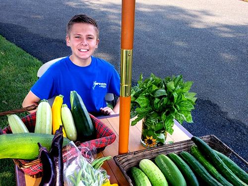 Emil working his produce stand.